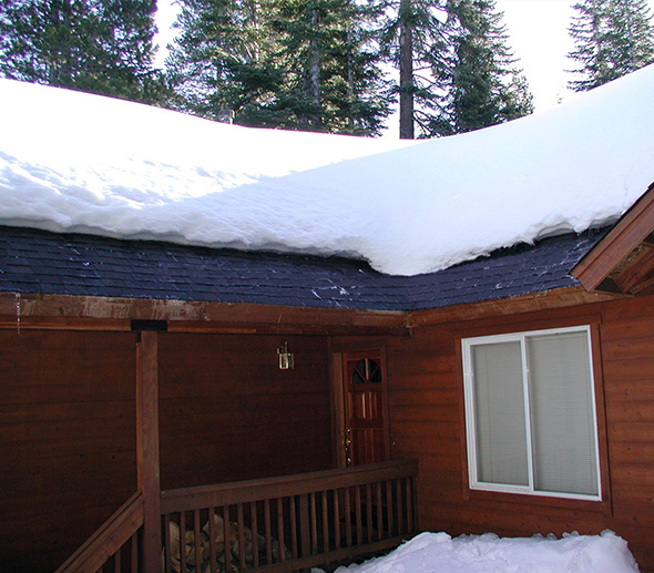 Roof de-icing system installed to heat roof eaves and prevent ice dams.